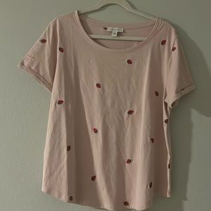 Pink shirt with strawberries on it